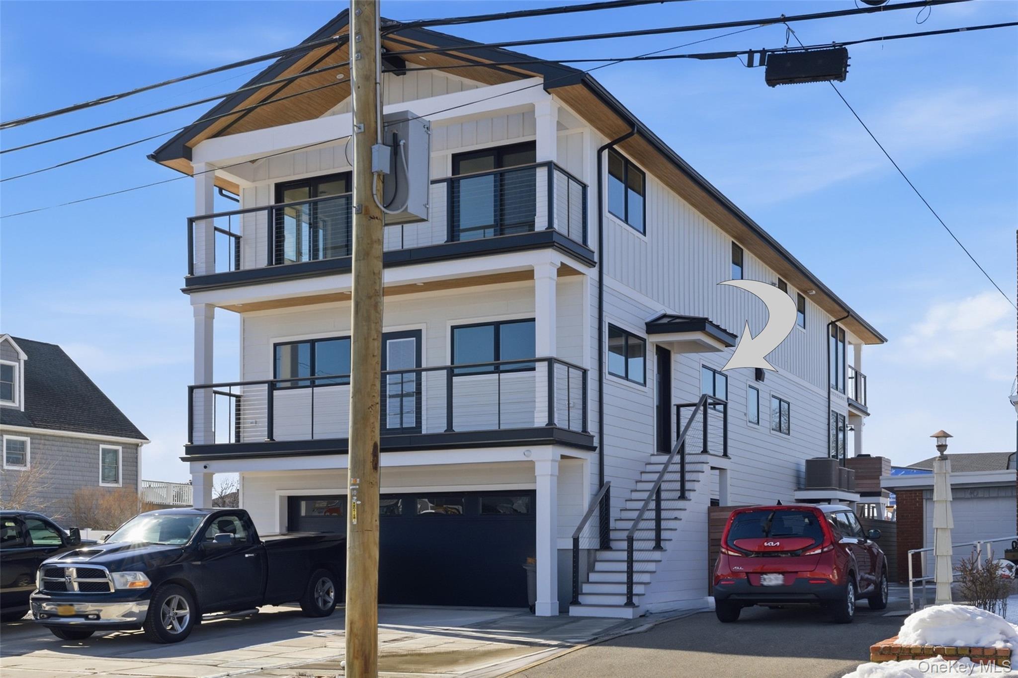 56 Suffolk Road Island Park, NY 11558 - Photo 1 of 14 a car parked in front of a building