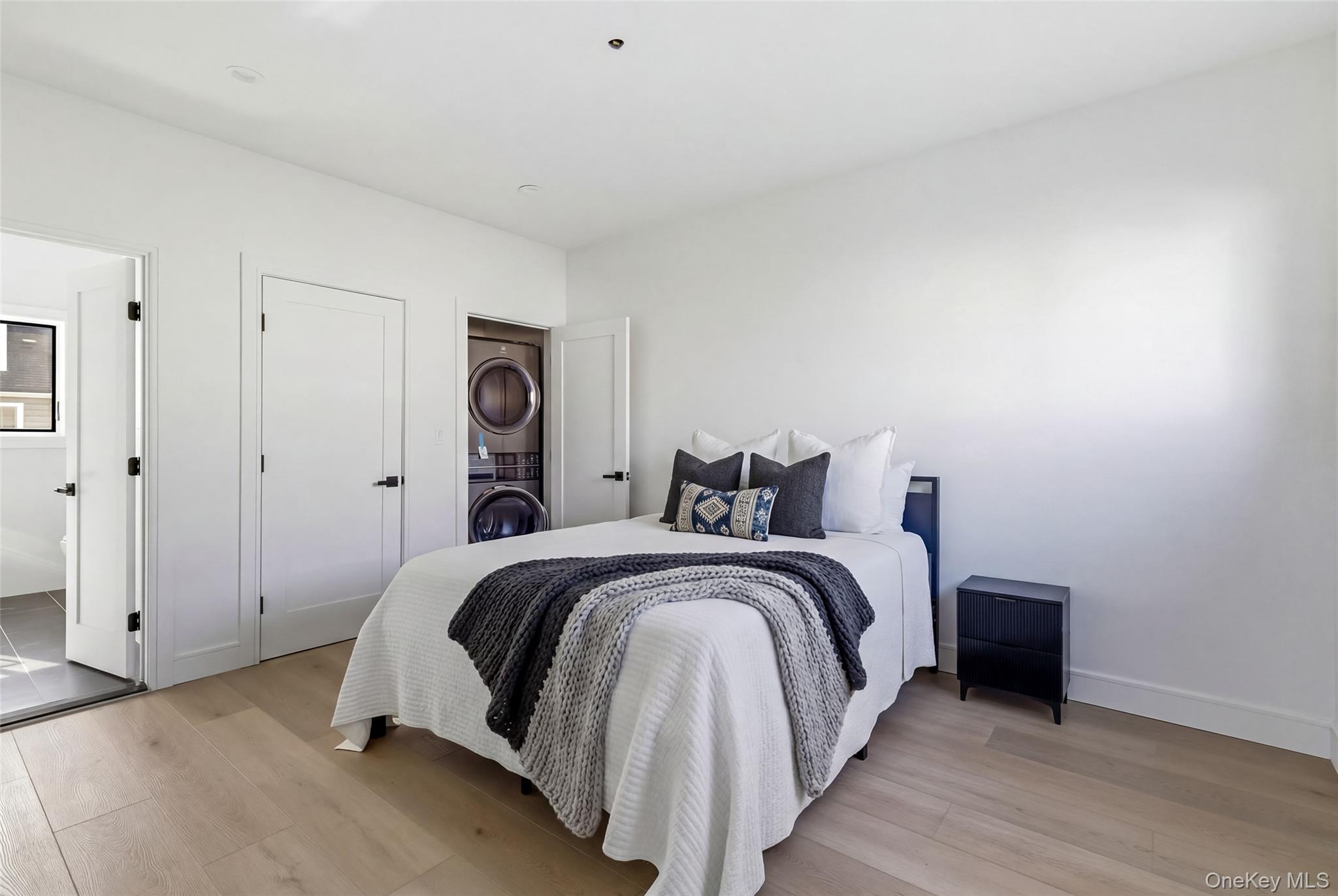 56 Suffolk Road Island Park, NY 11558 - Photo 12 of 14 a bed room with a bed and a night stand