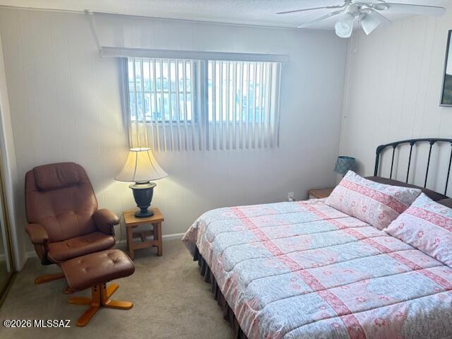 5731 West Flying M Street Tucson, AZ 85713 - Photo 16 of 20 a bedroom with bed couch and window