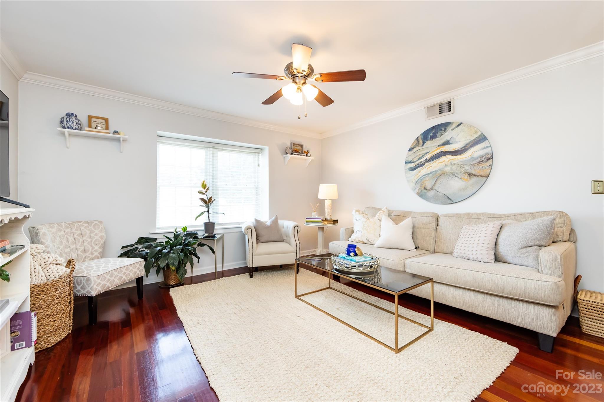 3520 Colony Road, Unit C Charlotte, NC 28211 - Photo 5 of 25 a living room with furniture and a large window