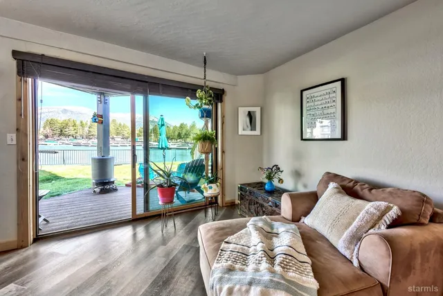 a view of a chairs and table in patio