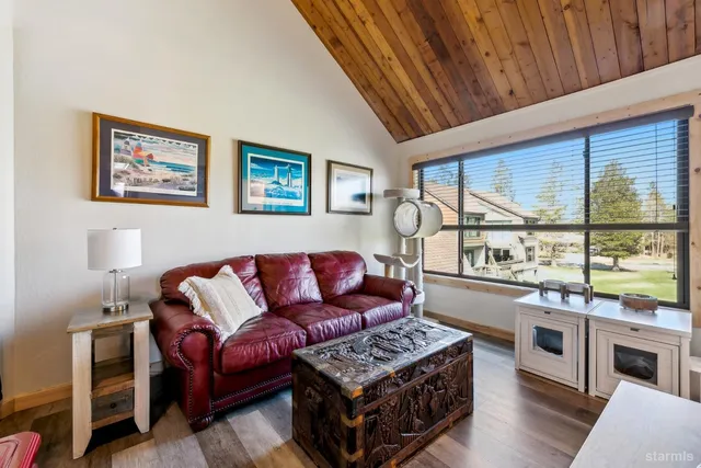 a bathroom with a sink toilet and mirror