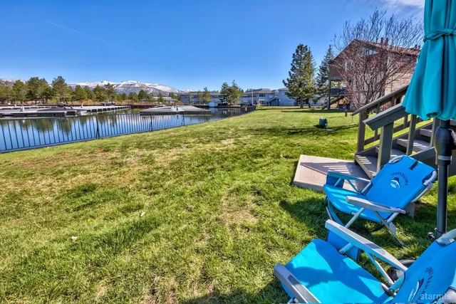a view of swimming pool with outdoor seating
