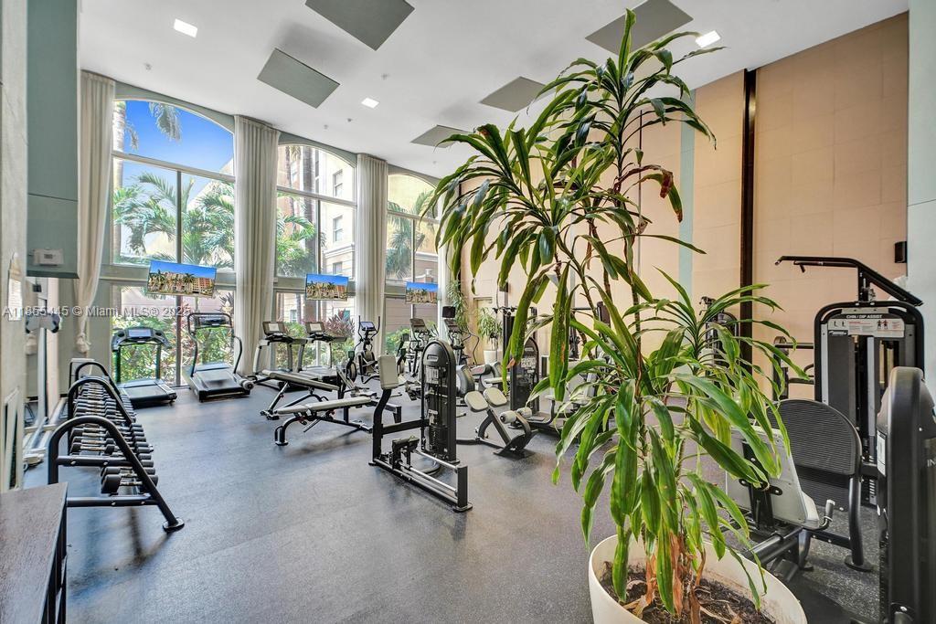 17100 North Bay Road, Unit 1511 Sunny Isles Beach, FL 33160 - Photo 30 of 71 a view of a livingroom with furniture and floor to ceiling window