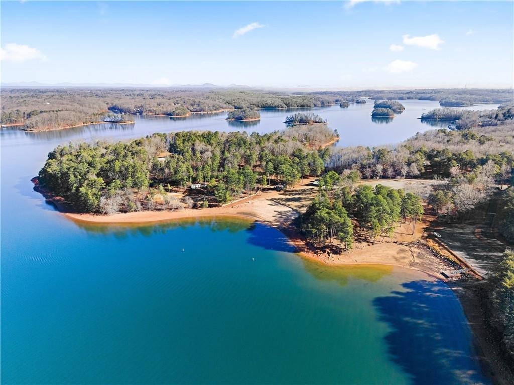 3533 Keith Bridge Road Gainesville, GA 30504 - Photo 19 of 22 a view of a lake with a mountain