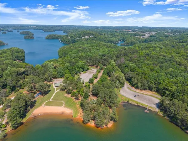 a view of lake with green space