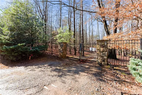 a view of a backyard with sitting area