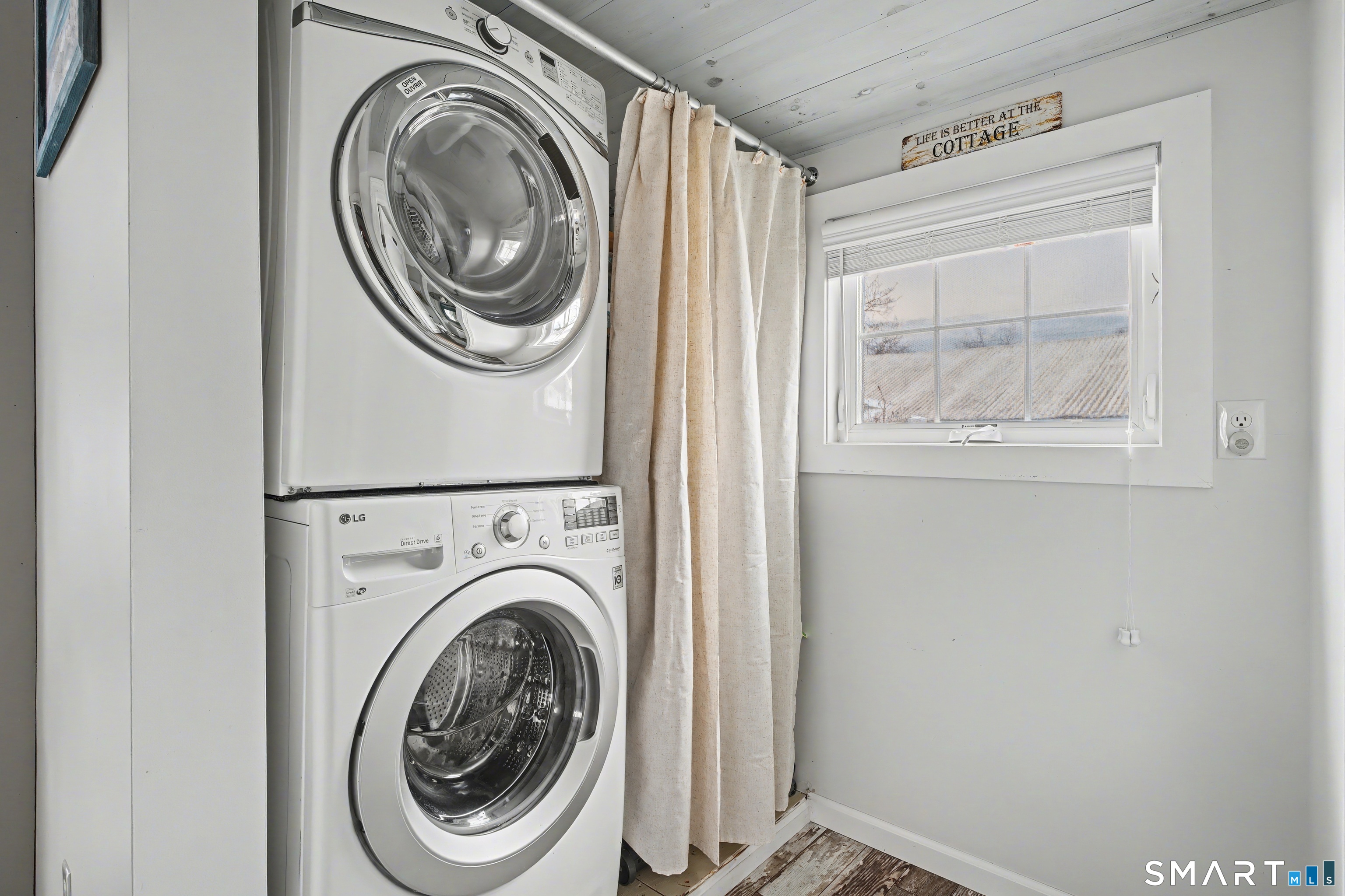 26 North Street Madison, CT 06443 - Photo 21 of 33 a utility room with dryer and washer