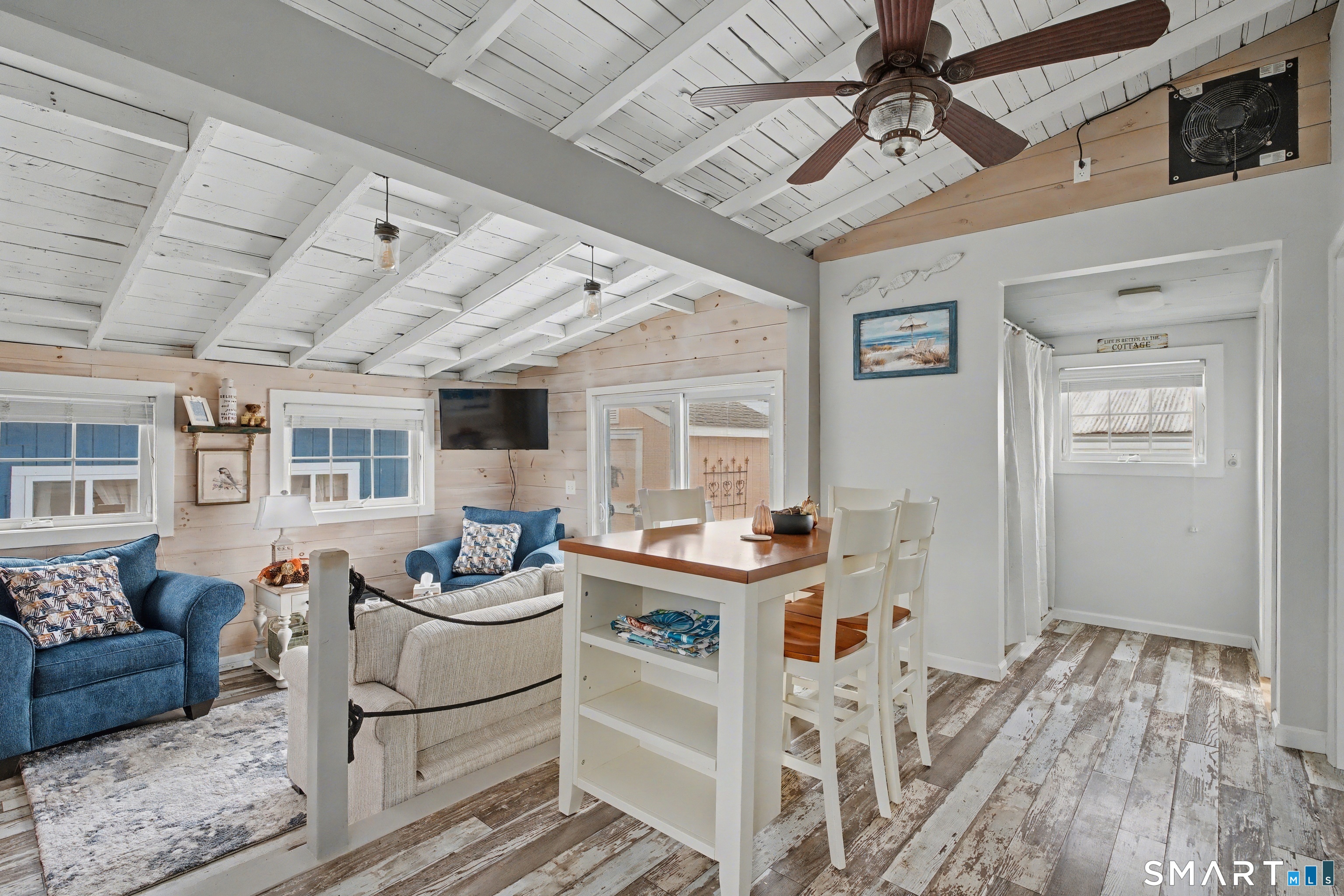 26 North Street Madison, CT 06443 - Photo 10 of 33 a living room with furniture