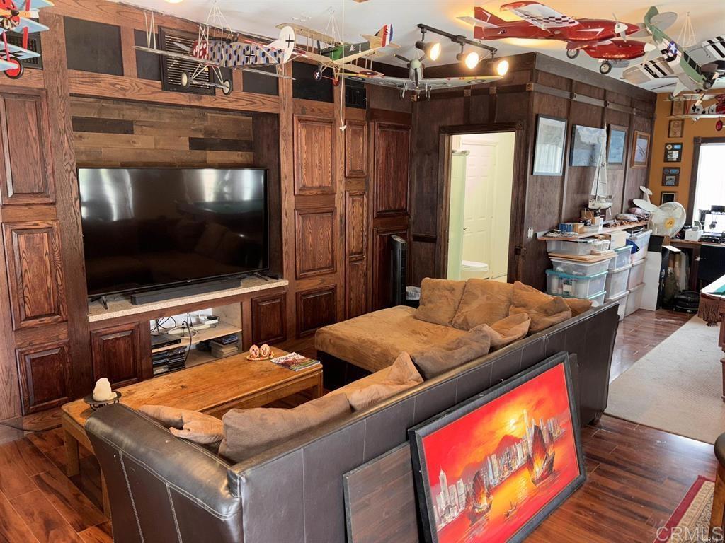 2399 Paige Circle Fallbrook, CA 92028 - Photo 15 of 18 a room with furniture pool table flat screen tv and windows