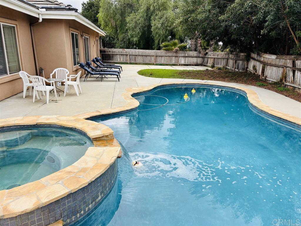 2399 Paige Circle Fallbrook, CA 92028 - Photo 5 of 18 a view of a swimming pool with a patio