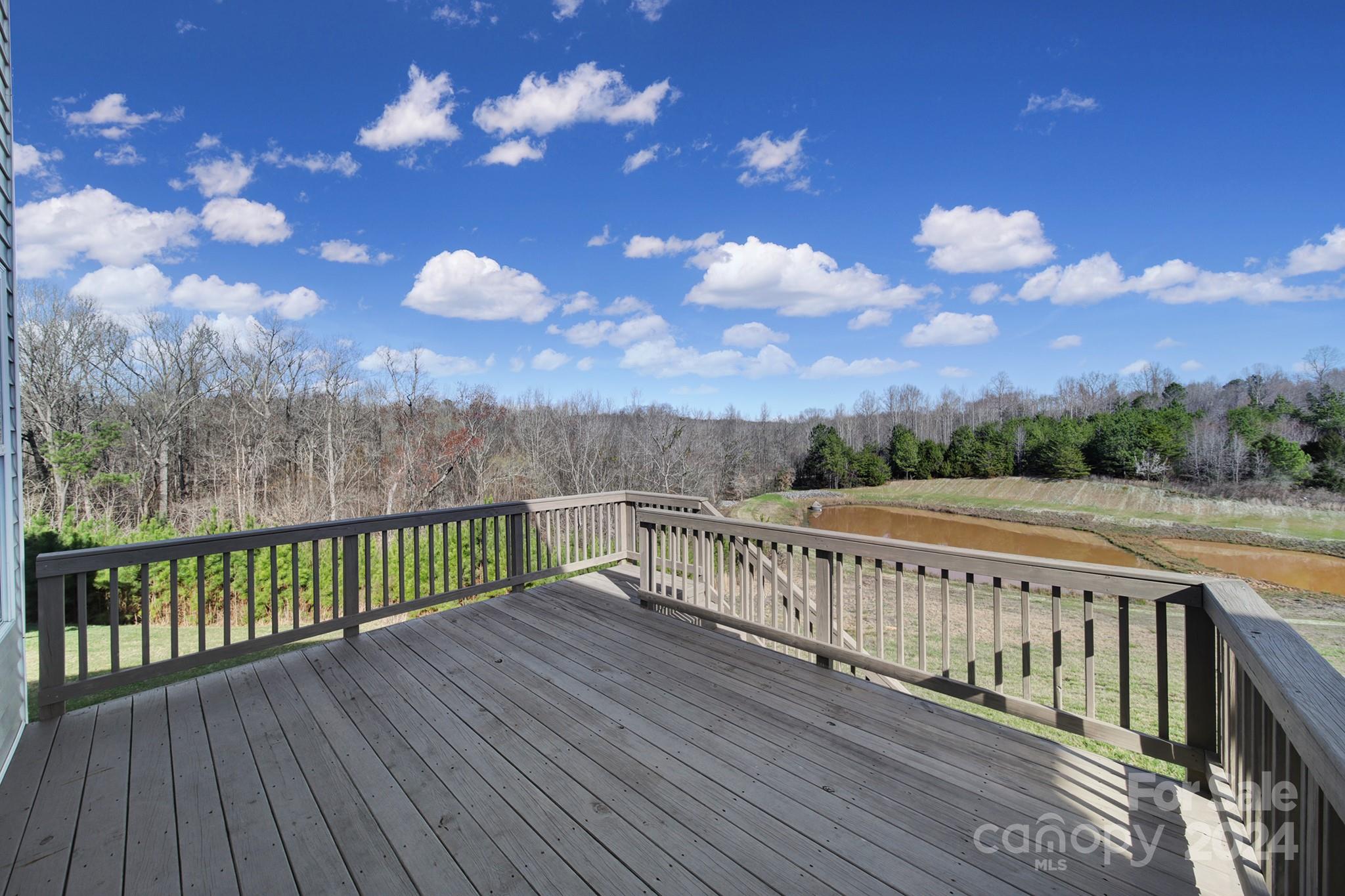 9518 Inverness Bay Road Charlotte, NC 28278 - Photo 34 of 42 a view of a balcony with wooden floor
