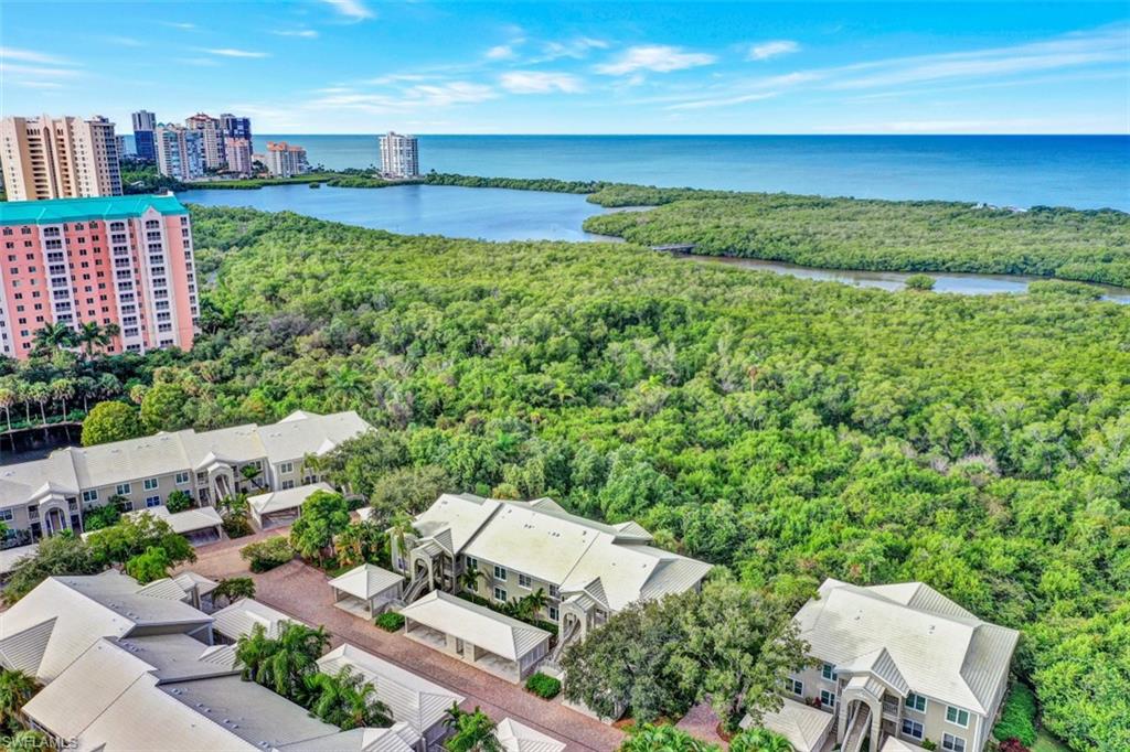 5897 Chanteclair Drive, Unit 314 Naples, FL 34108 - Photo 19 of 20 a view of a city