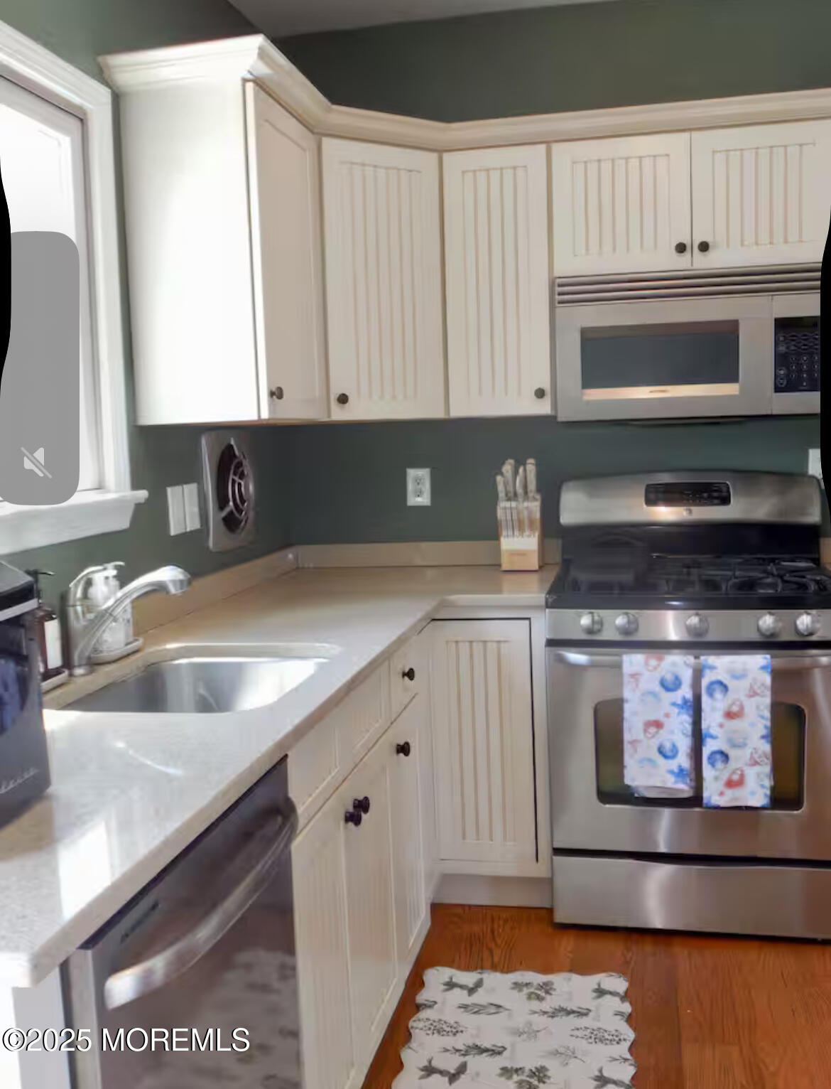 24 Philadelphia Avenue Lavallette, NJ 08735 - Photo 18 of 41 a kitchen with stainless steel appliances granite countertop a sink stove and microwave