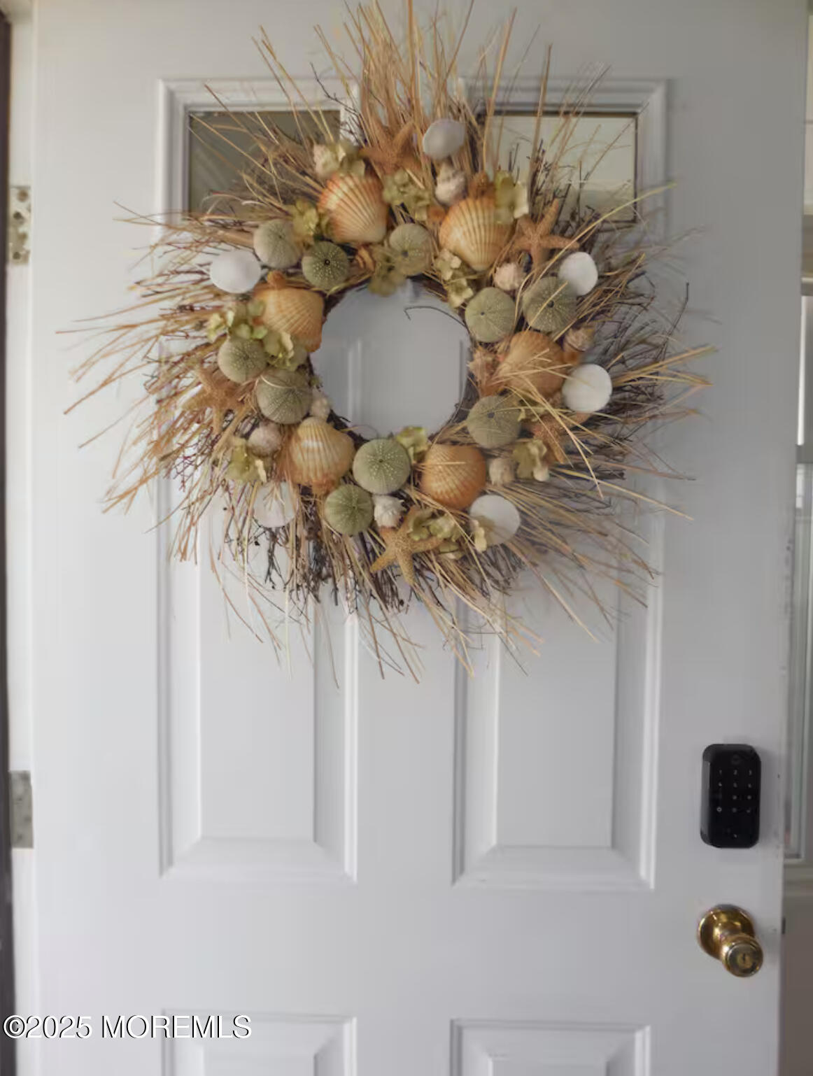 24 Philadelphia Avenue Lavallette, NJ 08735 - Photo 3 of 41 a vase of flowers sitting on a table