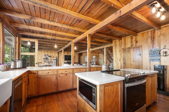 a bathroom with a toilet and a mirror