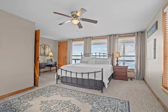 a view of living room kitchen and entryway