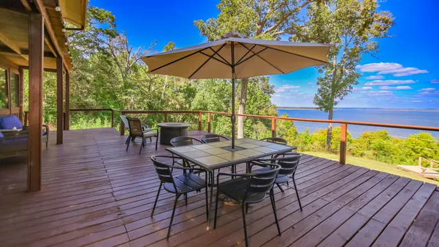 a view of a swimming pool with a yard