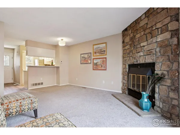 a view of livingroom with furniture and windows
