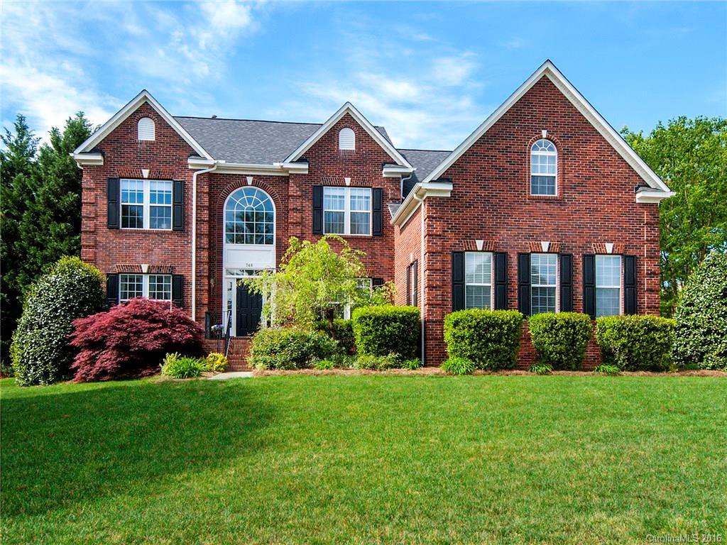 748 Drew Avenue Fort Mill, SC 29708 - Photo 1 of 23 a front view of a house with a yard