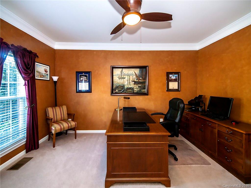 748 Drew Avenue Fort Mill, SC 29708 - Photo 2 of 23 a living room with furniture and a flat screen tv