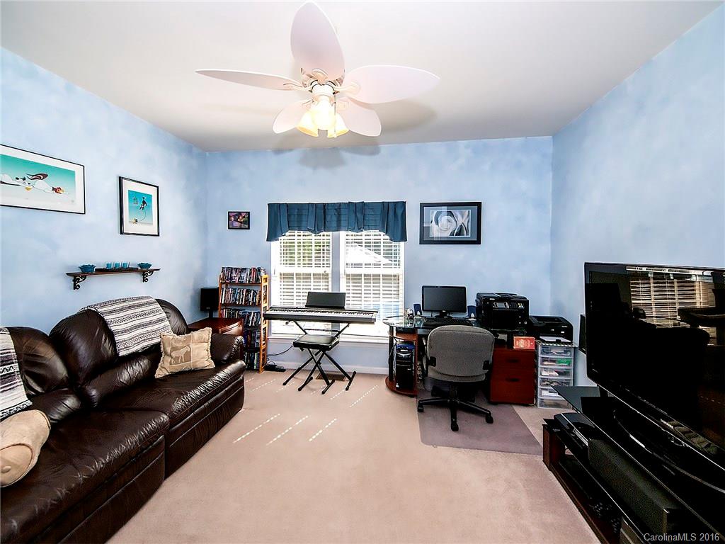 748 Drew Avenue Fort Mill, SC 29708 - Photo 12 of 23 a living room with furniture and a flat screen tv