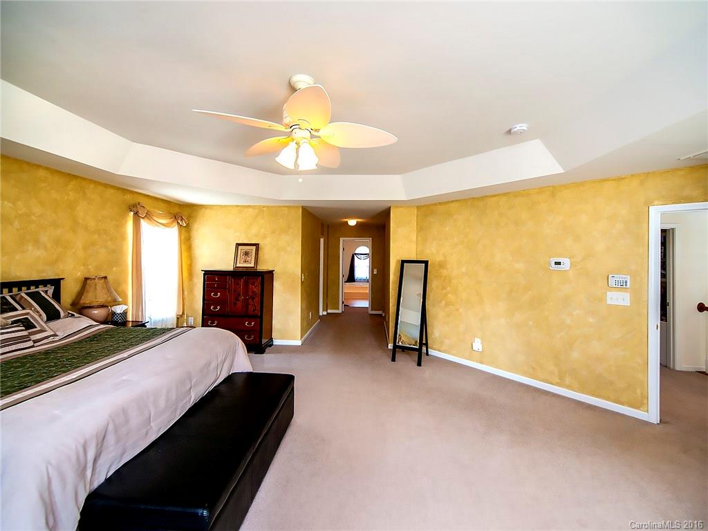 748 Drew Avenue Fort Mill, SC 29708 - Photo 14 of 23 a view of a bedroom with furniture and large windows