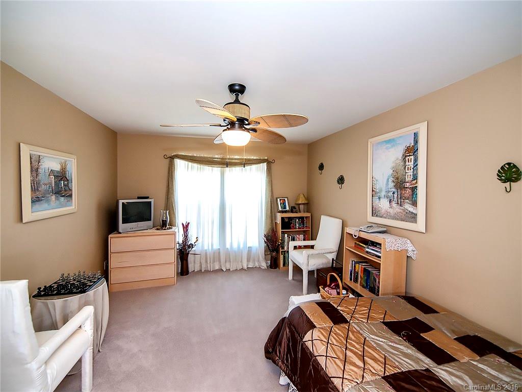 748 Drew Avenue Fort Mill, SC 29708 - Photo 19 of 23 a bedroom with furniture and a large window