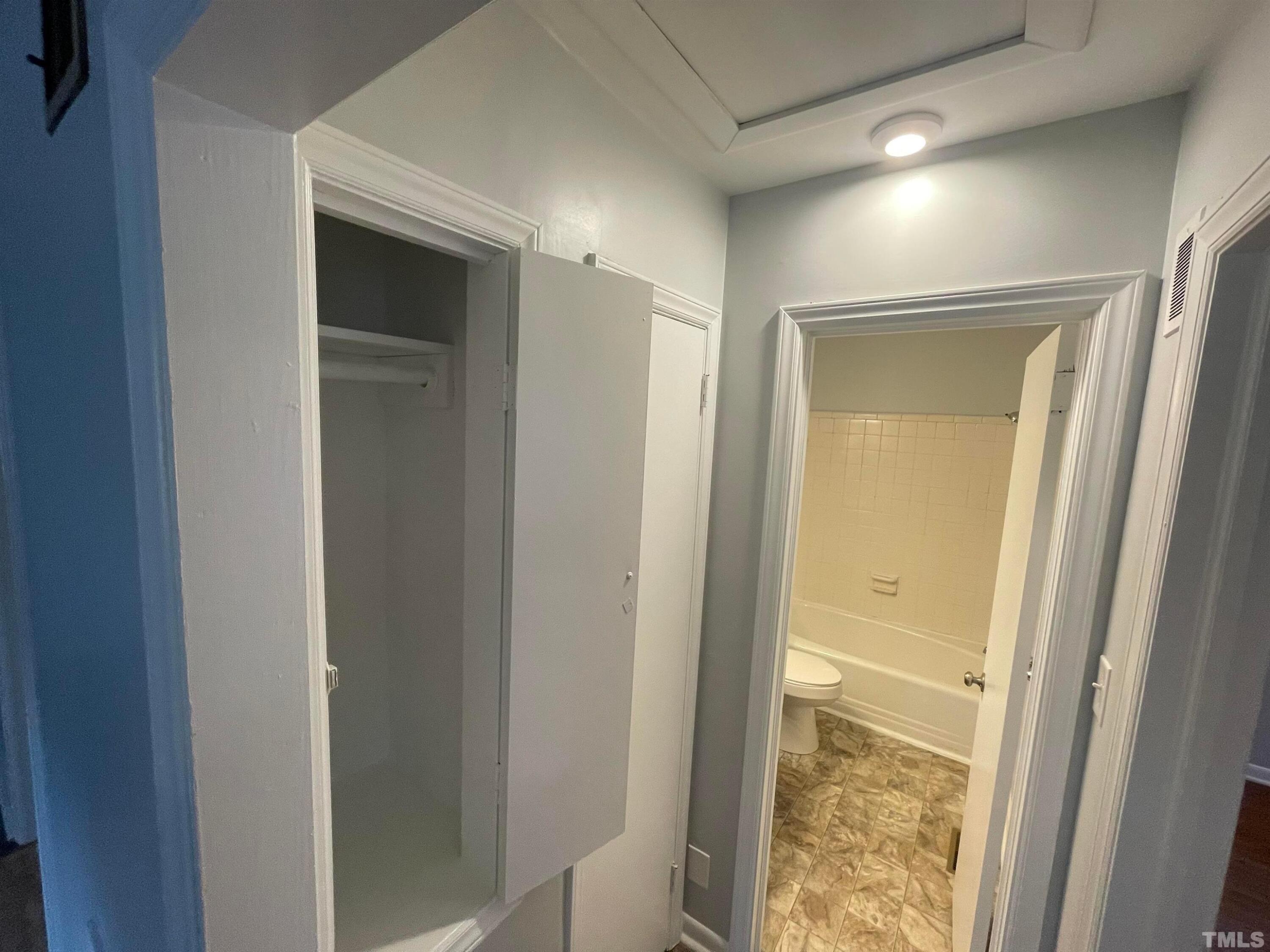 334 Clark Street, Unit A Durham, NC 27701 - Photo 11 of 16 a view of hallway with wooden floor