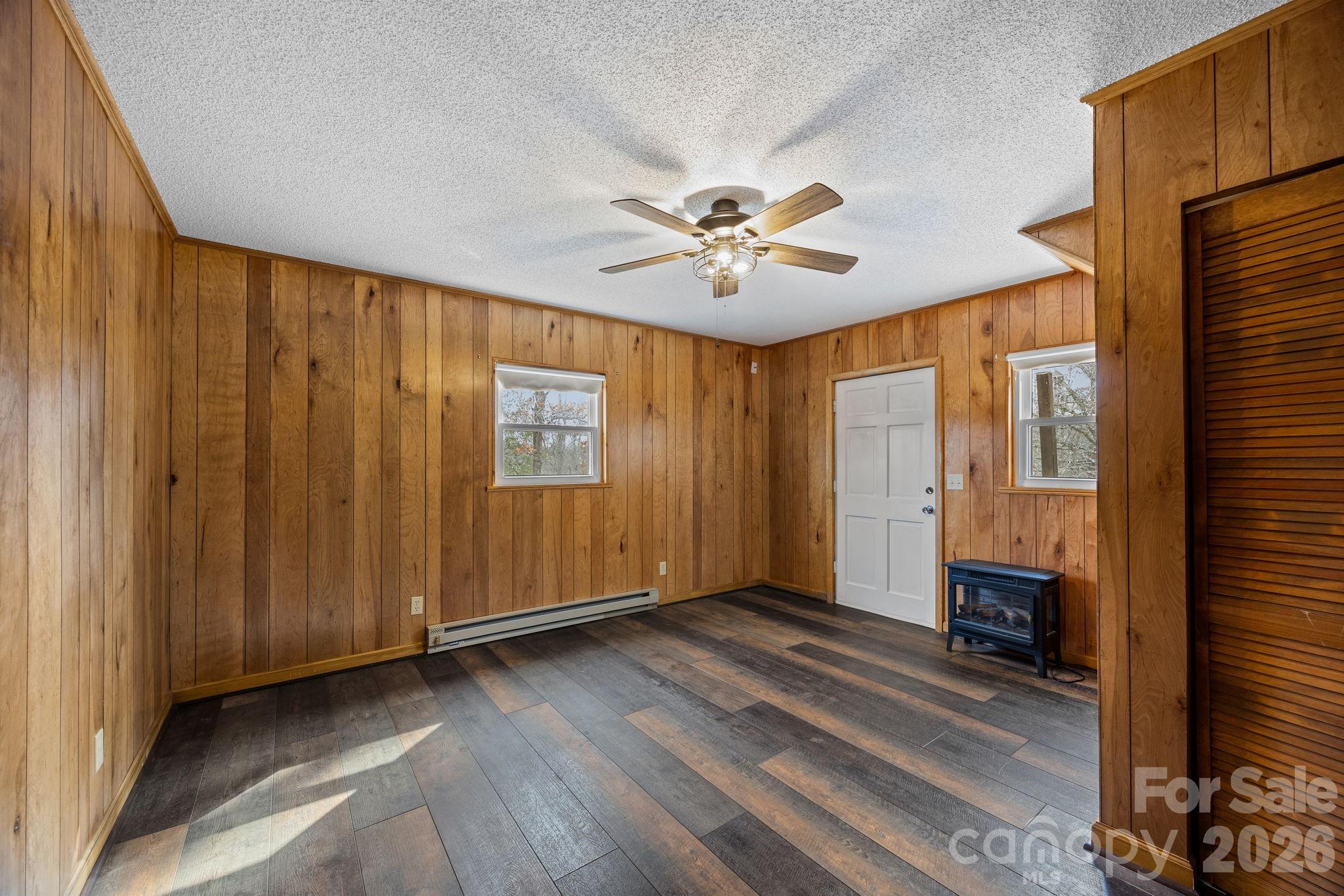 1169 Rickman Creek Road Franklin, NC 28734 - Photo 20 of 43 a view of an empty room with a window