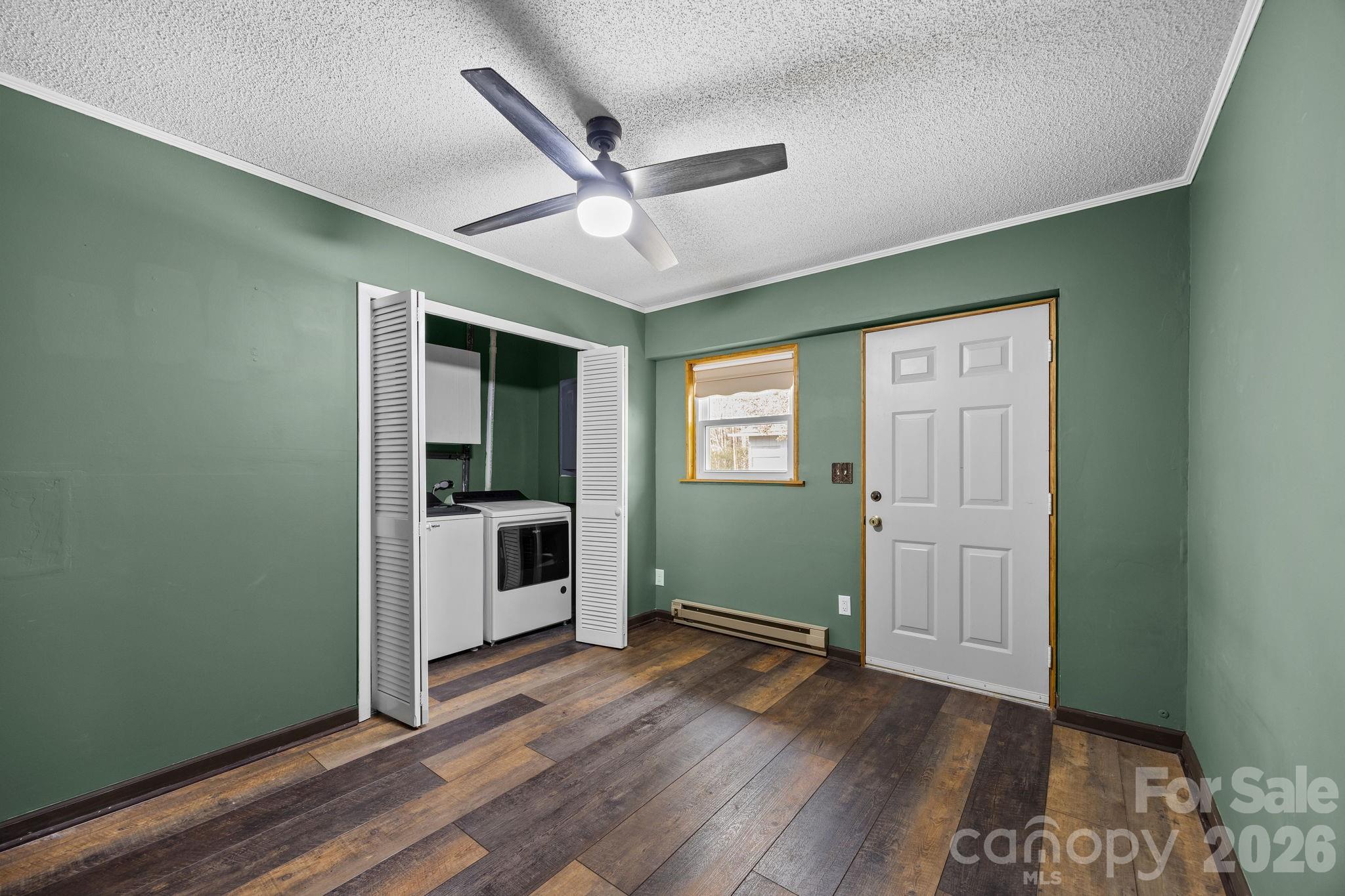 1169 Rickman Creek Road Franklin, NC 28734 - Photo 25 of 43 a view of a kitchen with a sink and a window
