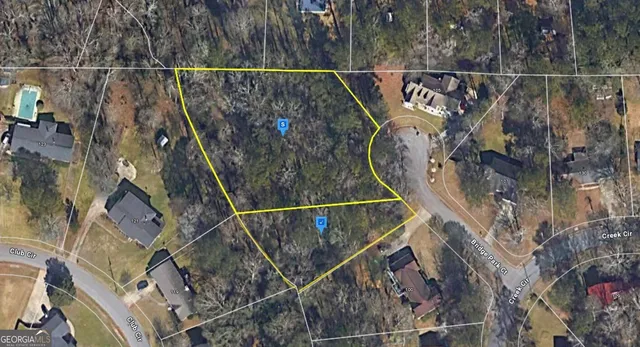 a view of a balcony with wooden floor