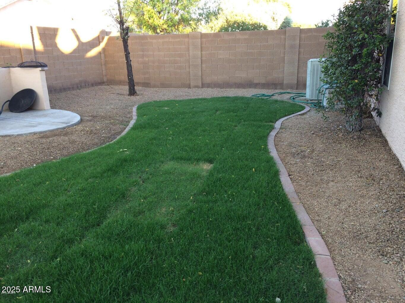 2240 East Aire Libre Avenue Phoenix, AZ 85022 - Photo 16 of 18 a view of a back yard