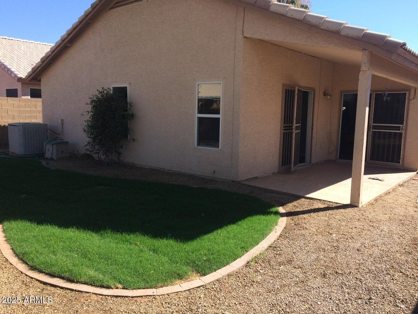 2240 East Aire Libre Avenue Phoenix, AZ 85022 - Photo 17 of 18 a view of a house with backyard