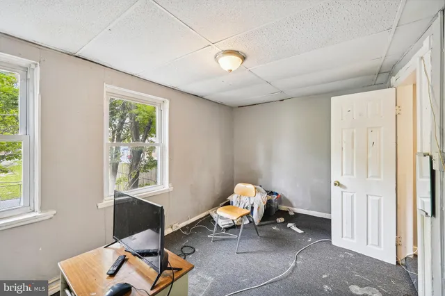 a house with a tree in front of it