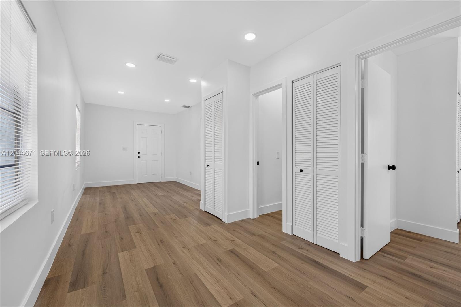 1900 Southwest 6th Street, Unit 6 Miami, FL 33135 - Photo 6 of 20 a view of a room with wooden floor
