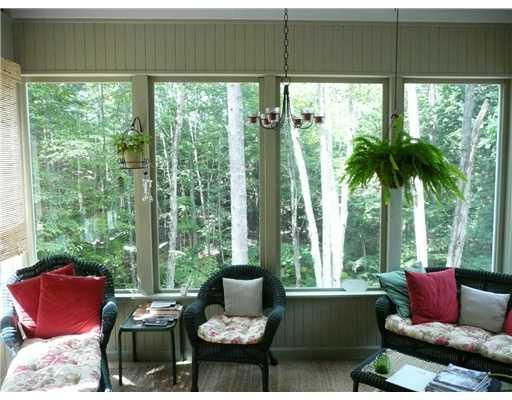 10 Alpine Road Bridgton, ME 04009 - Photo 16 of 25 Patio/Deck. enclosed porch...