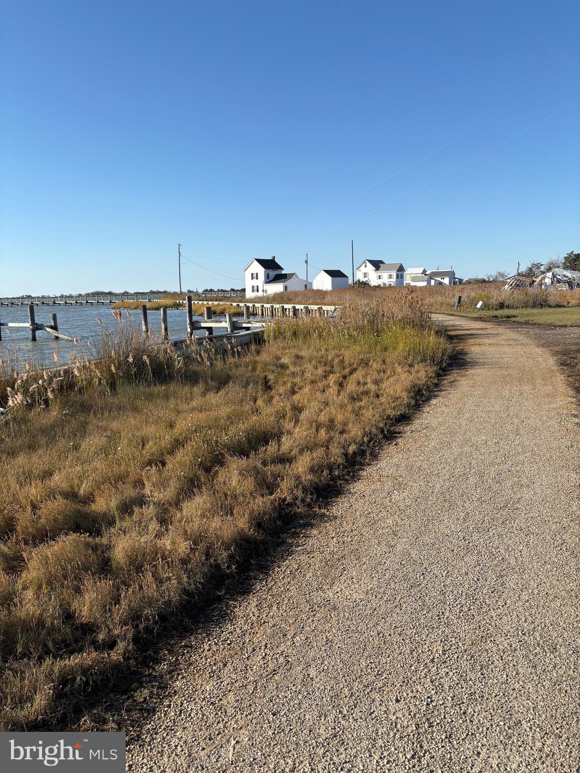 7 Tylerton Road Tylerton, MD 21866 - Photo 3 of 16 a view of a beach and ocean view