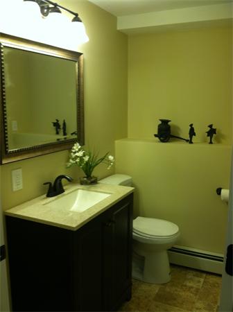 10 Colonial Road Sutton, MA 01590 - Photo 7 of 13 a bathroom with a sink and a toilet
