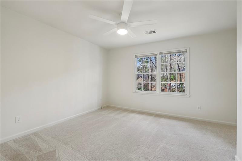 105 Inverness Approach Roswell, GA 30075 - Photo 32 of 51 an empty room with windows