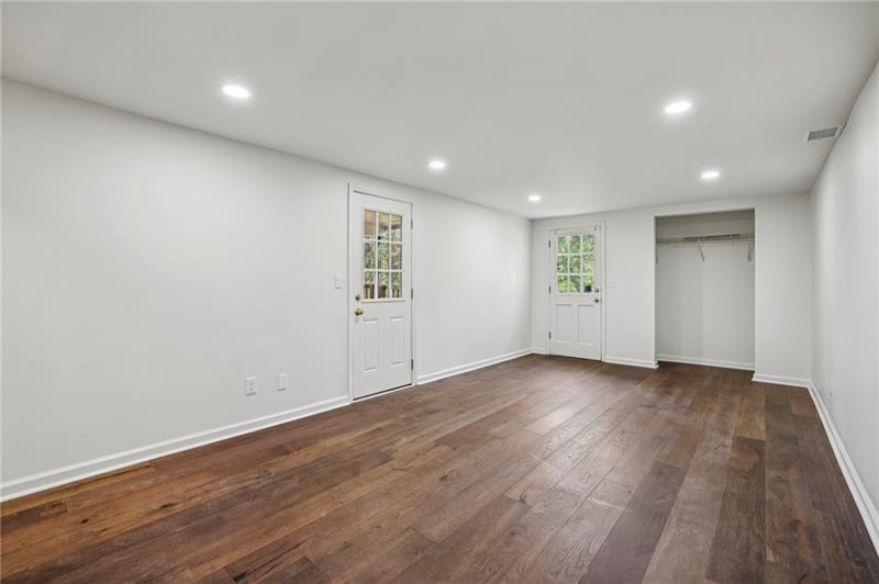 105 Inverness Approach Roswell, GA 30075 - Photo 36 of 51 a view of an empty room with wooden floor
