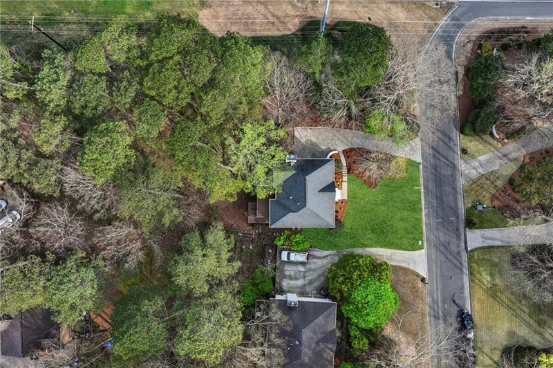 105 Inverness Approach Roswell, GA 30075 - Photo 44 of 51 an aerial view of a house with a yard