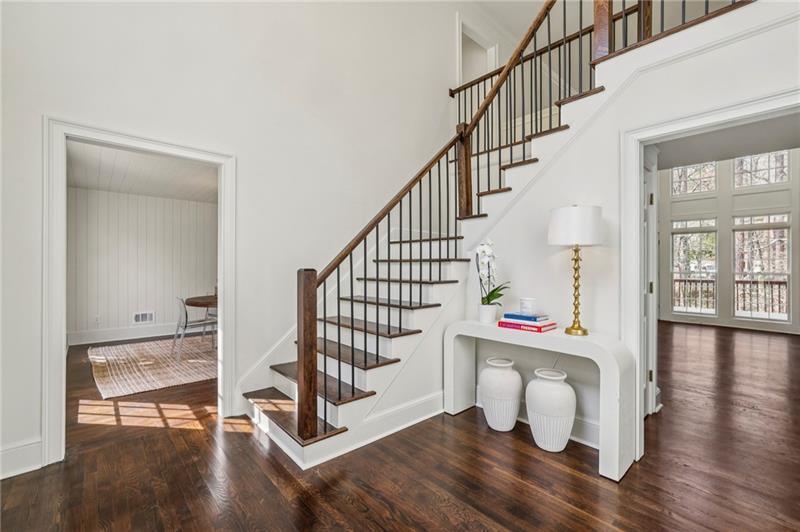 105 Inverness Approach Roswell, GA 30075 - Photo 6 of 51 a view of entryway with wooden floor and stairs