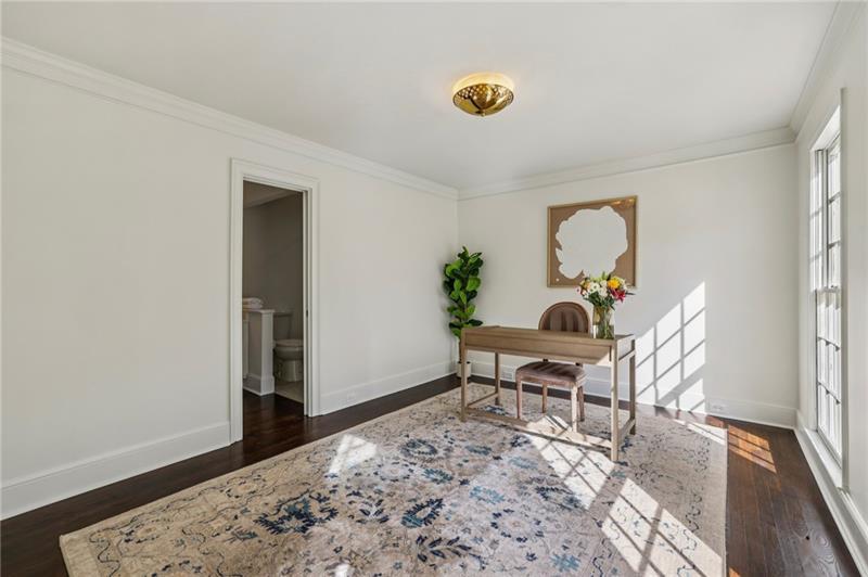 105 Inverness Approach Roswell, GA 30075 - Photo 8 of 51 a living room with furniture and a wooden floor
