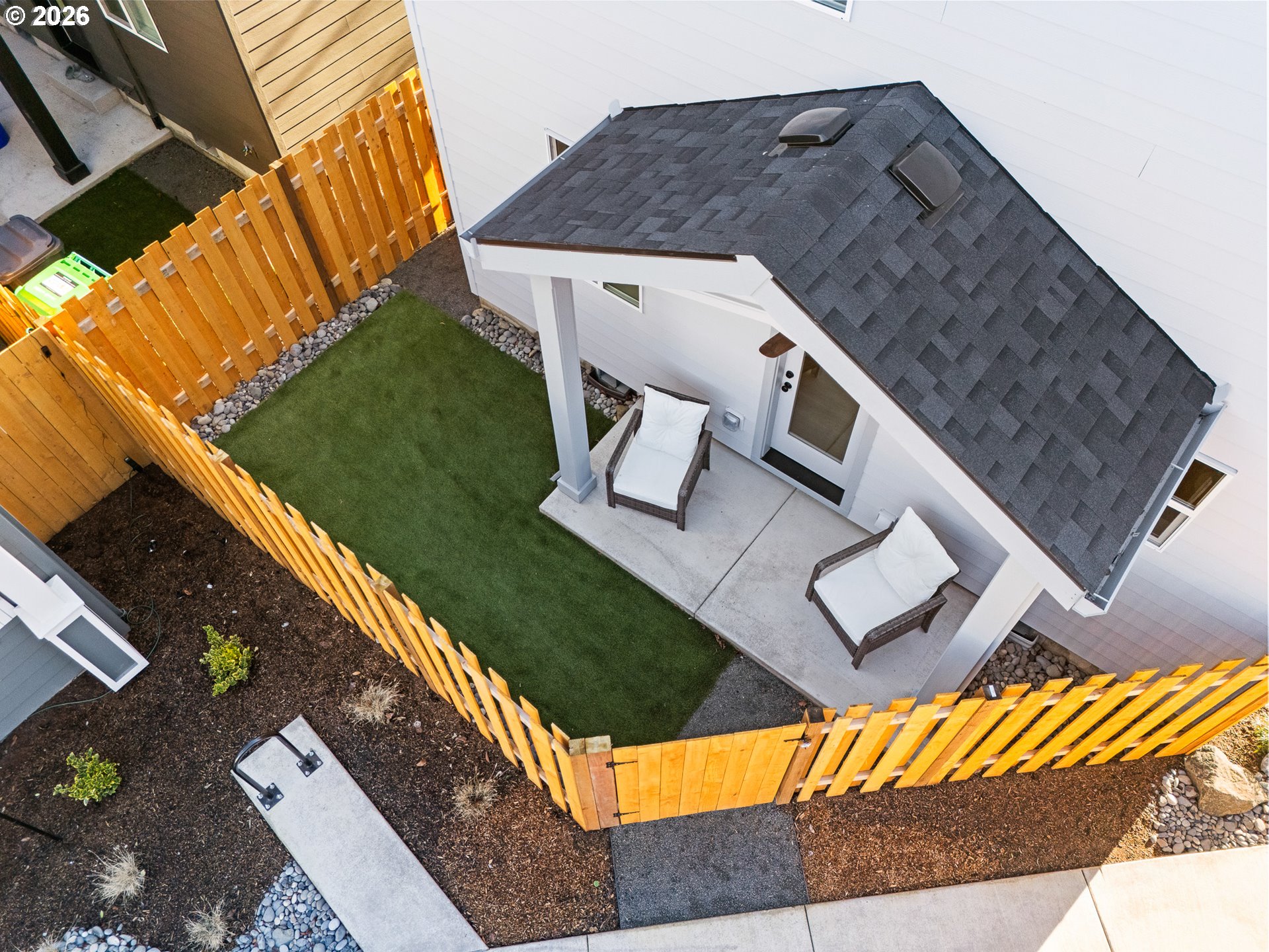 7460 North Polk Avenue Portland, OR 97203 - Photo 17 of 25 an aerial view of a house with a yard