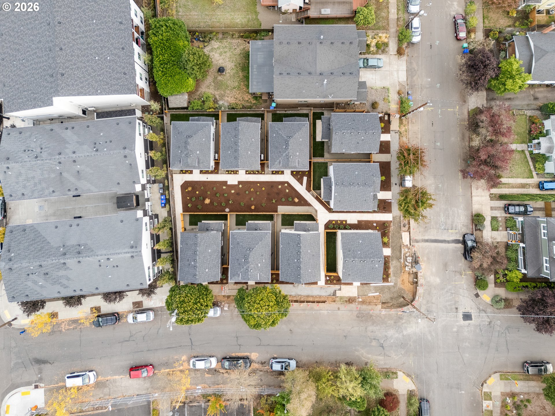 7460 North Polk Avenue Portland, OR 97203 - Photo 19 of 25 an aerial view of residential houses with outdoor space