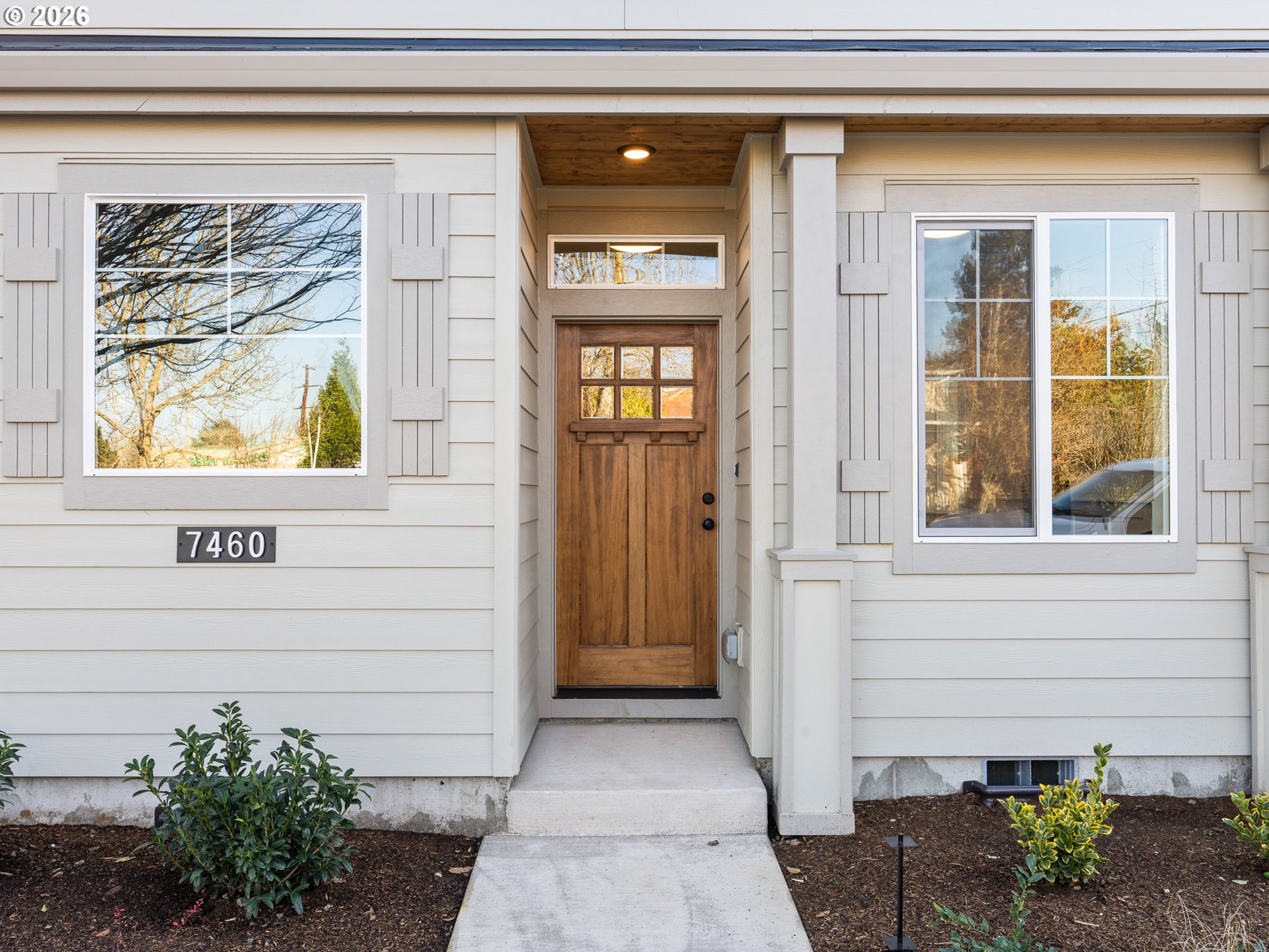 7460 North Polk Avenue Portland, OR 97203 - Photo 2 of 25 a view of front door of house with a window