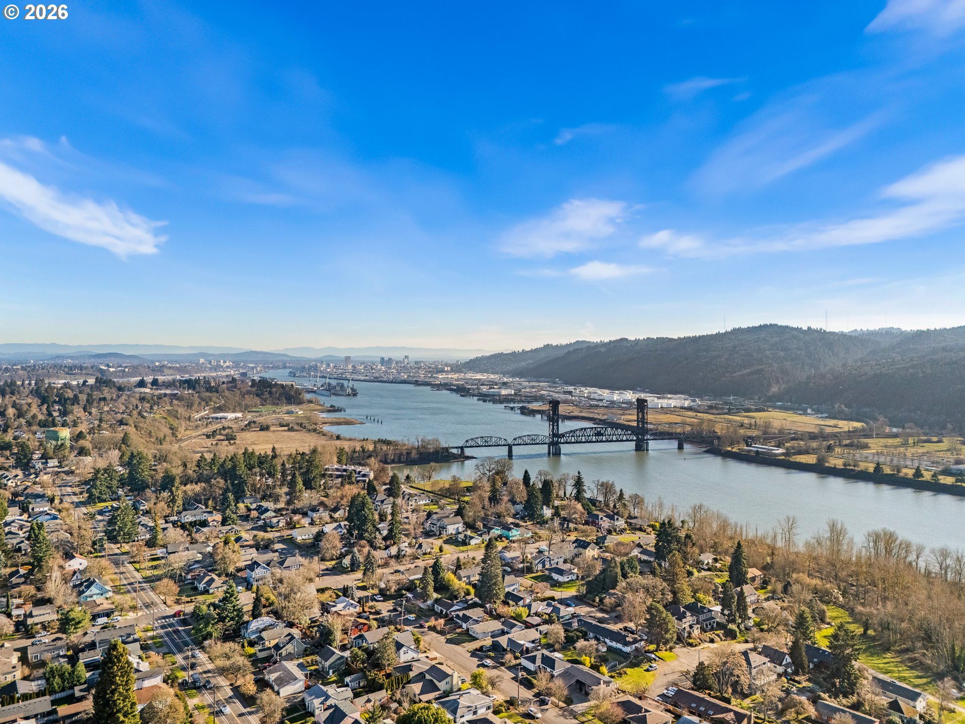 7460 North Polk Avenue Portland, OR 97203 - Photo 25 of 25 a view of a lake with a city