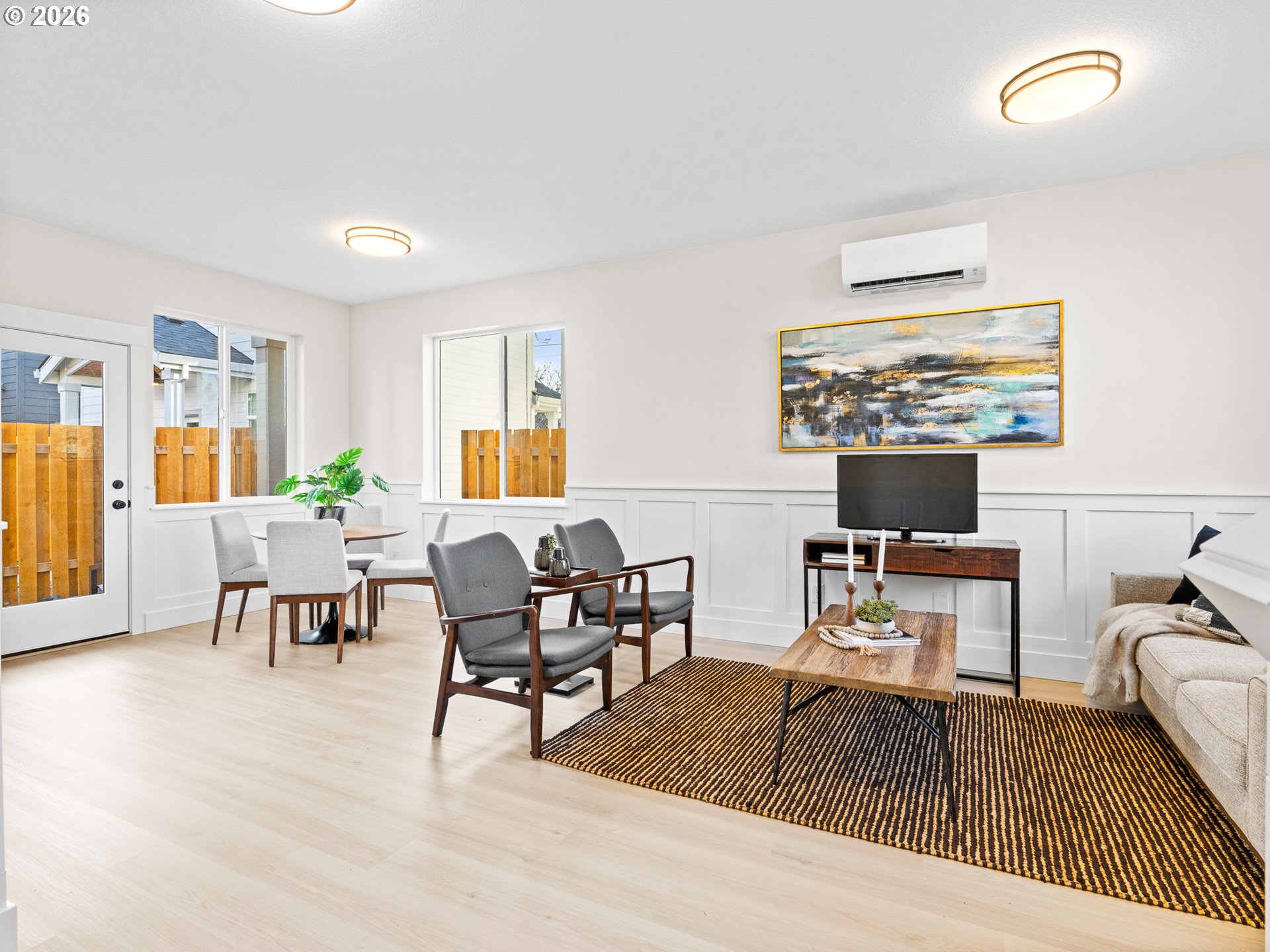 7460 North Polk Avenue Portland, OR 97203 - Photo 5 of 25 a living room with furniture and a wooden floor