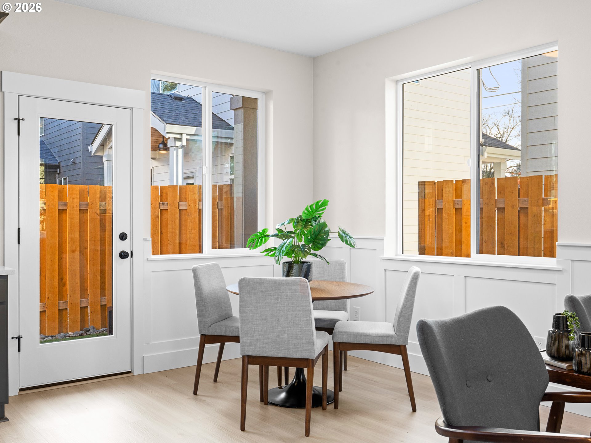 7460 North Polk Avenue Portland, OR 97203 - Photo 6 of 25 a view of a dining room with furniture window and outside view